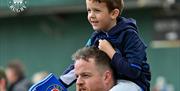 Boy on man's shoulders