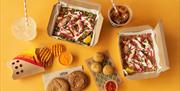 Selection of LEON dishes in takeaway cartons