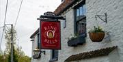 Exterior and pub sign at Ring o’ Bells
