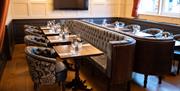 Tables and booth seating at The Bear Inn
