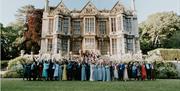 The whole party gathered in front of the Hall