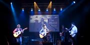 A group of performers on stage at the Chapel Arts Centre in Bath