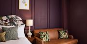 A purple hotel room at The Francis Hotel Bath