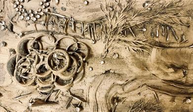 Image showing a cast of a botanical collage in plaster
