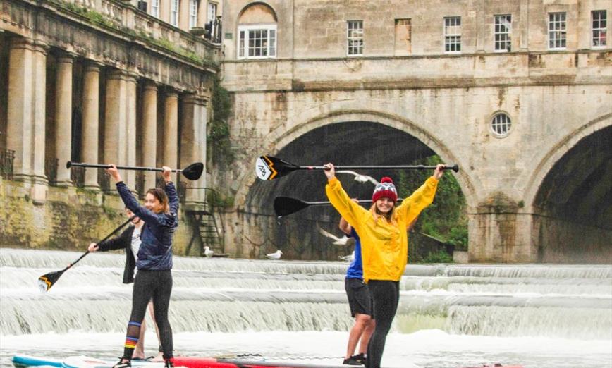 Stand up paddleboarders on Pulteney Weir