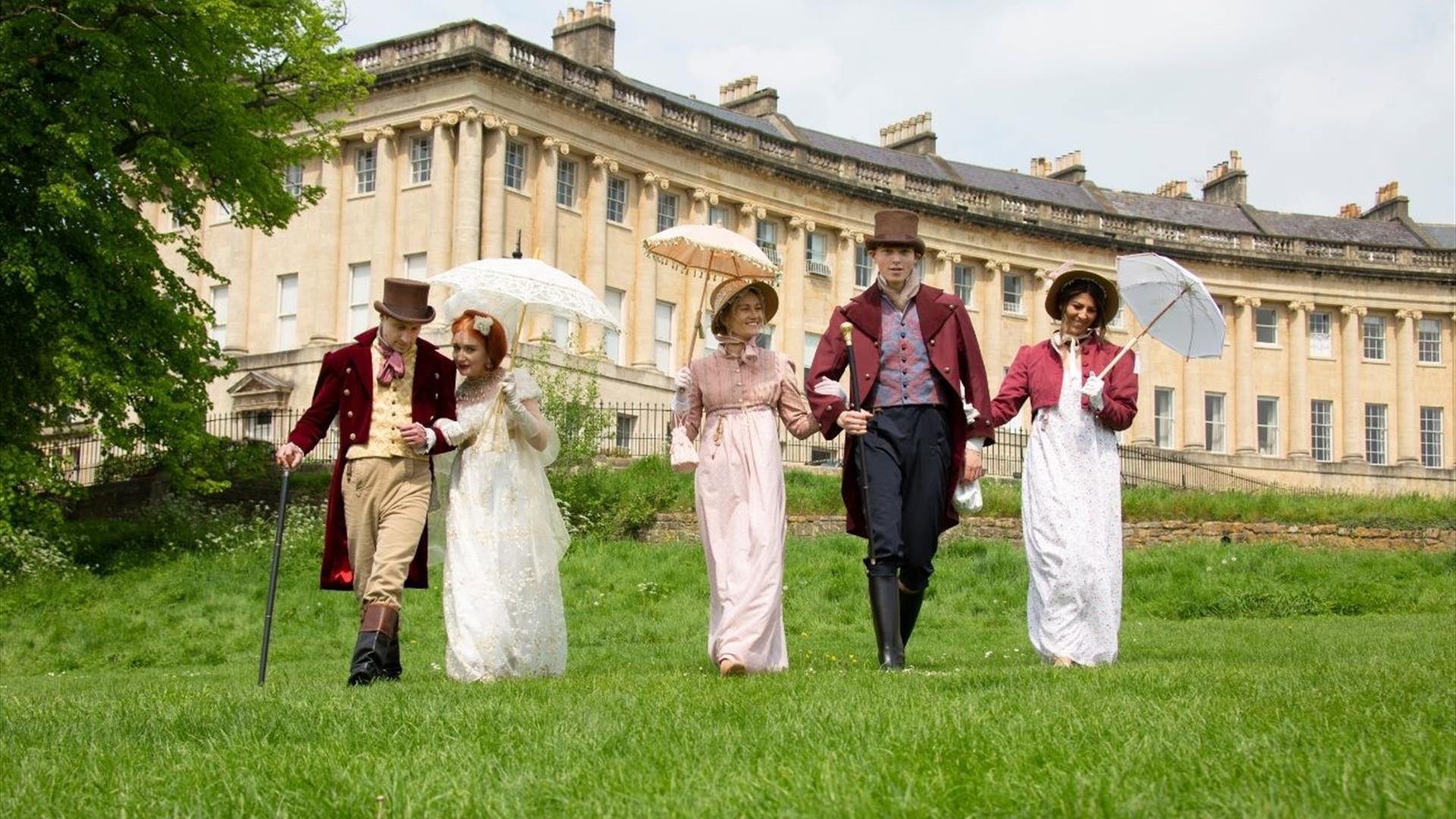 Tour group outside on grass at Royal Crescent