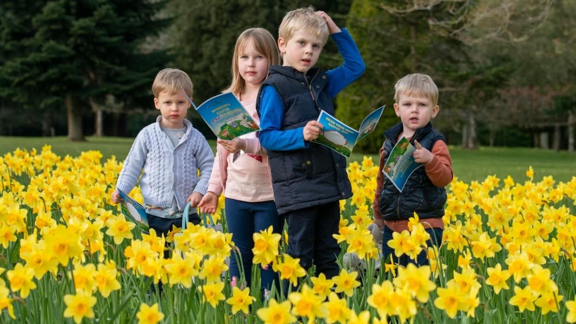 Children with daffodils at Bowood House and Gardens