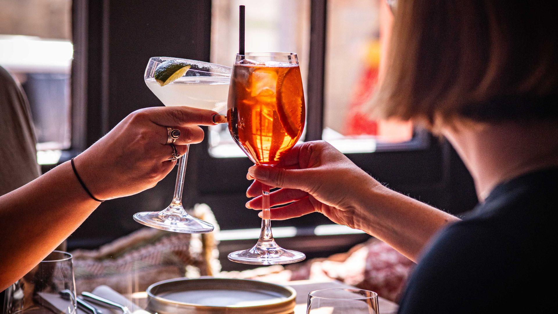 People with drinks at Sydney's in Bath