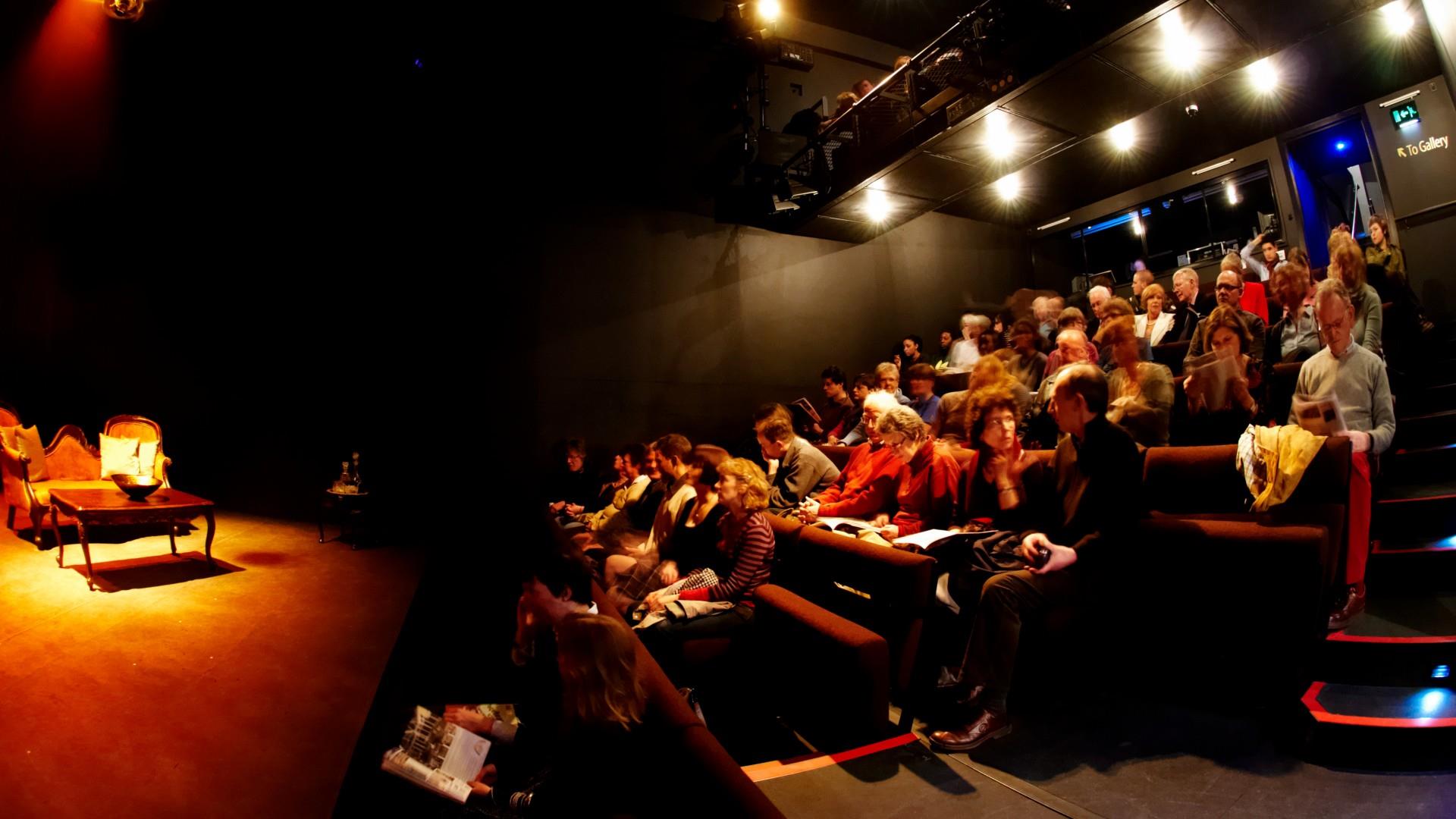 Audience fill the Ustinov Auditorium