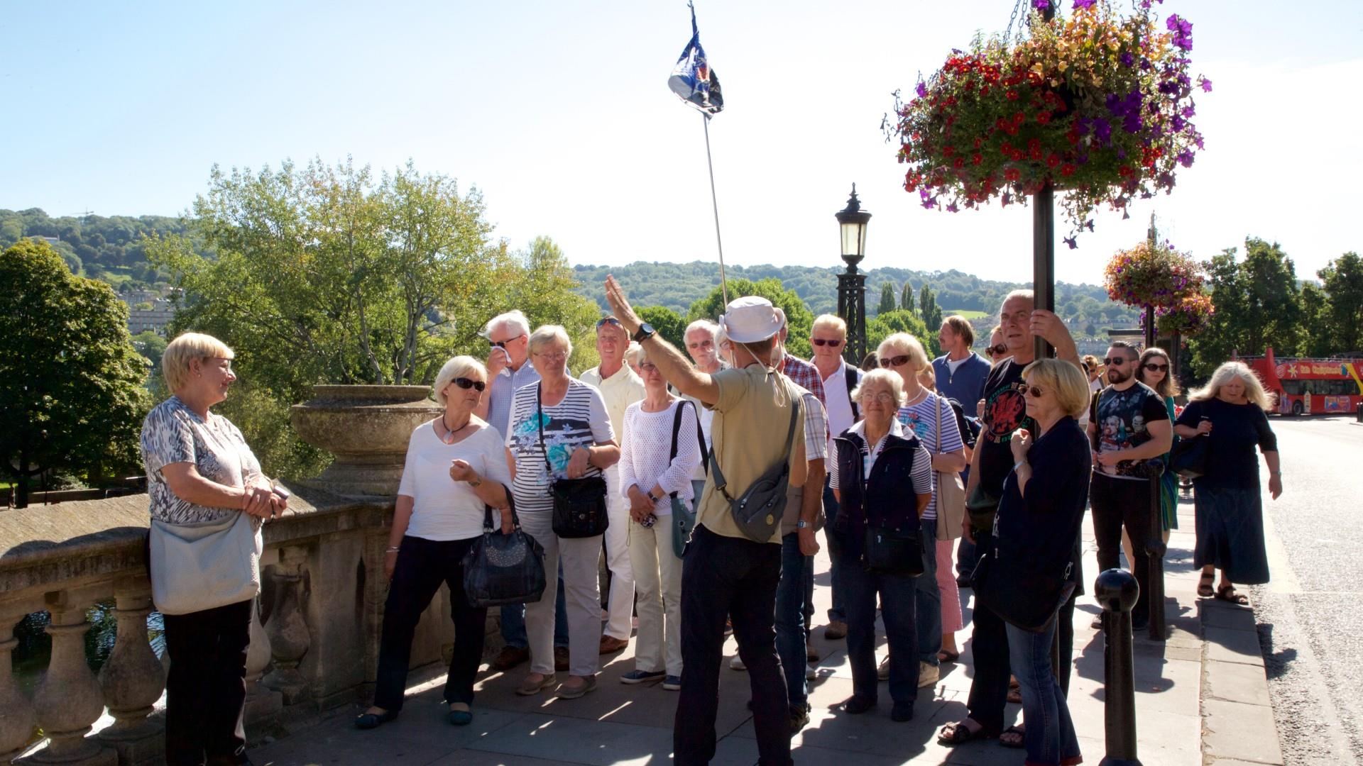Group enjoy a walking tour of Bath