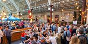 People sitting on one of the terraces at Green Park Brasserie and Bath Pizza Co.