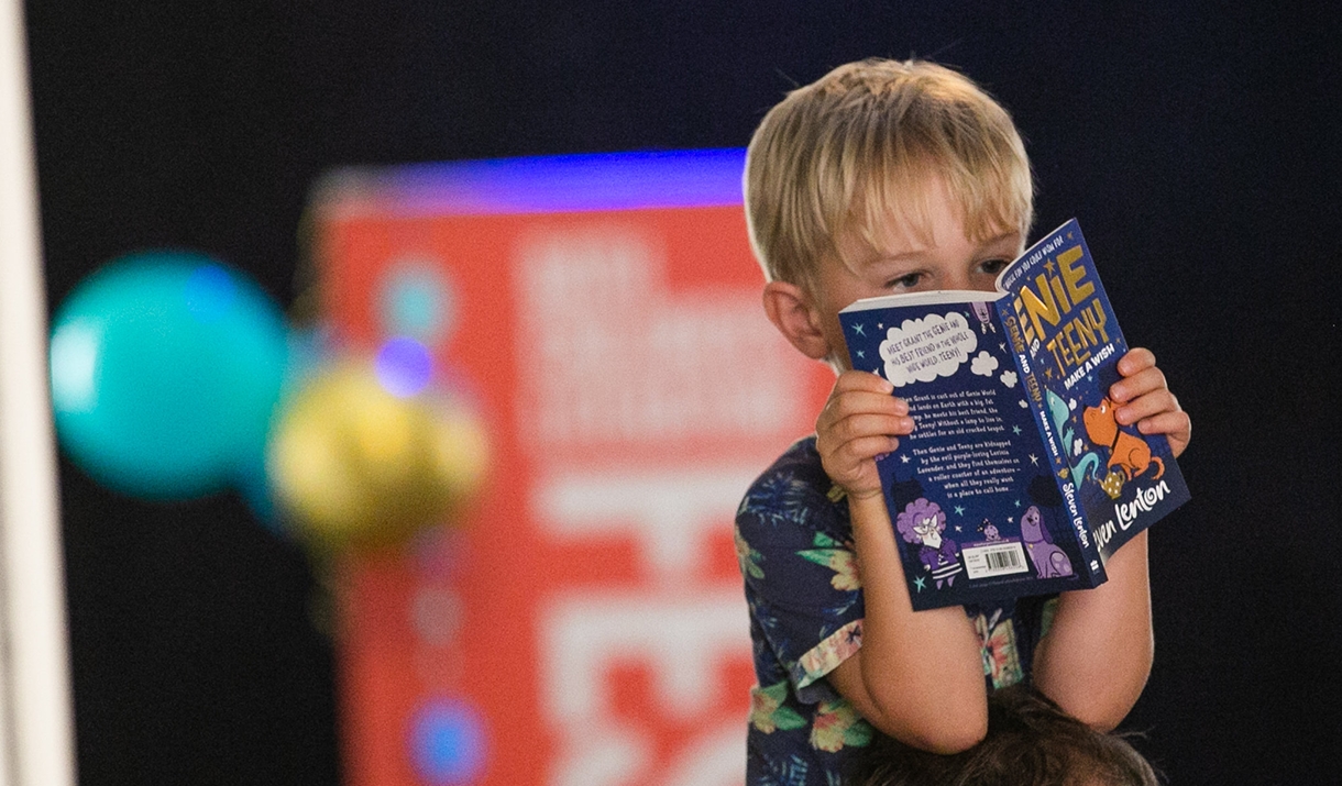 Child reading at Bath Children's Literature Festival 2021