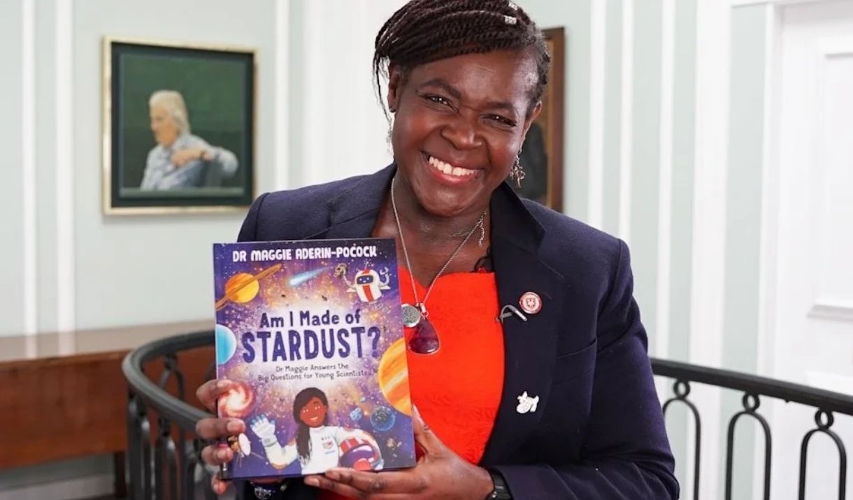 a woman holding her book a woman holding her book