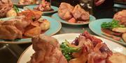 Roast dinners being plated up