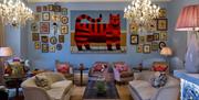 Lounge with two sofas and quirky art