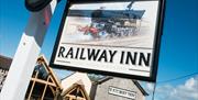 The Railway Inn sign