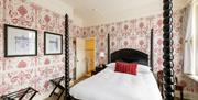 A four poster bedroom at The Royal Hotel Bath