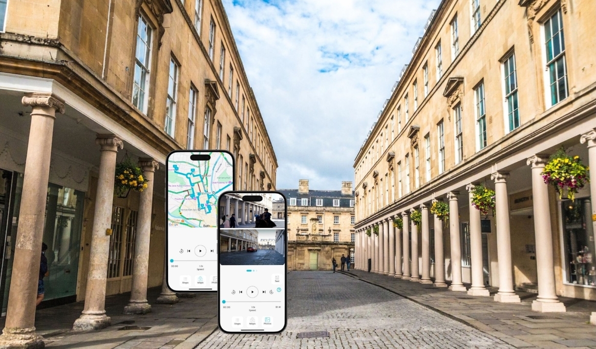 Phones displaying the tour app and a background of the city of Bath Phones displaying the tour app and a background of the city of Bath