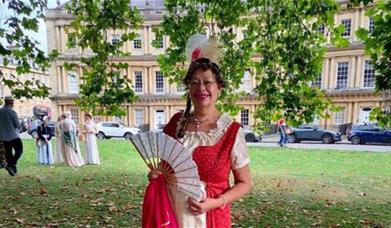 Woman in fancy dress on The Circus, Bath